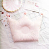 Coussin en mousse anti tête plate rose