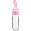 Cuillère à presser rose pour bébé