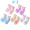 Paire de chaussette pour fille de couleur pastel avec des fleurs sur le dessus
