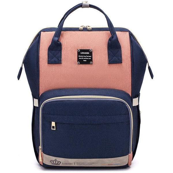 Sac a dos a langer de maternité pour les parents couleur bleu marine et orange