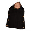 Gigoteuse en tricot noire pour bébé