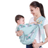 Porte bébé vert en écharpe style sling