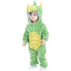 Petit enfant debout portant un pyjama vert dragon