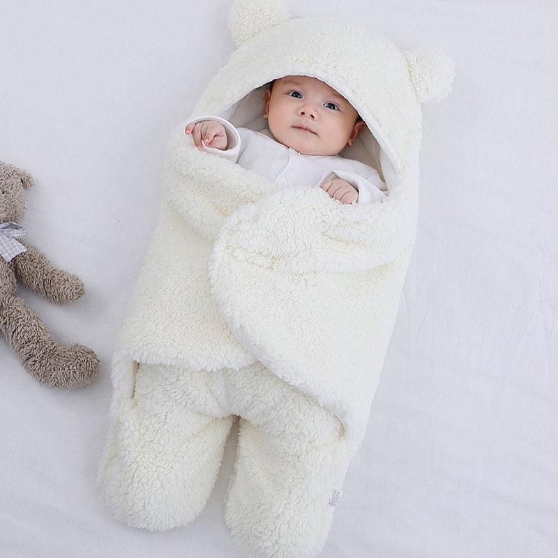 Sac de couchage blanc en coton molletonné pour garder bébé au chaud