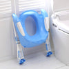 Réducteur de toilette bleu plié avec marche pied pour enfant